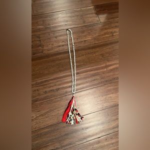 Elegant Beaded Necklace with Red and Black Tassels